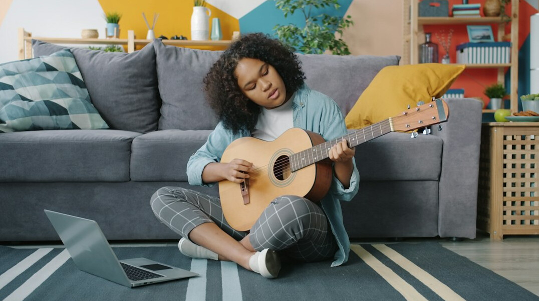 person practicing hobby at home